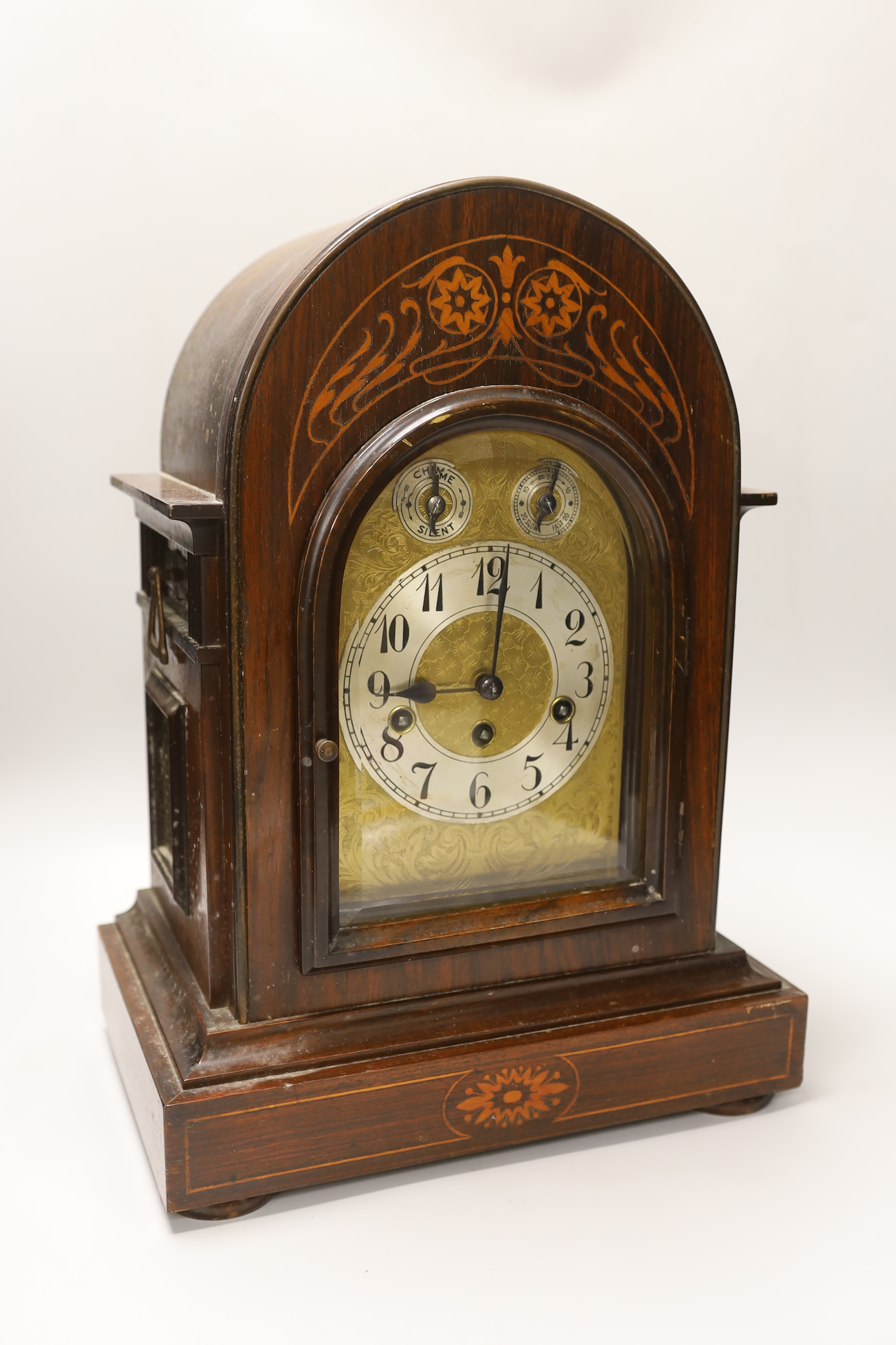 An Edwardian marquetry and inlaid chiming mantel clock, 45cm